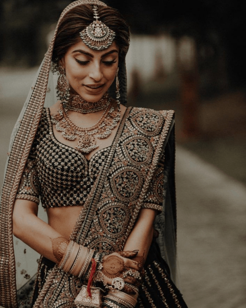 Sabyasachi Bottle Green Lehenga